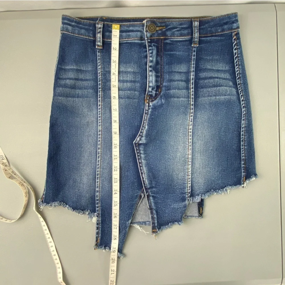 Machine torn up look blue jean mini skirt with stretch size large